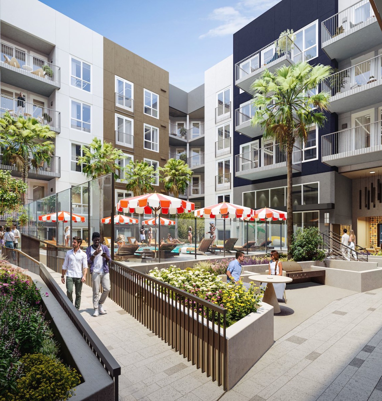 a courtyard with people, trees and umbrellas